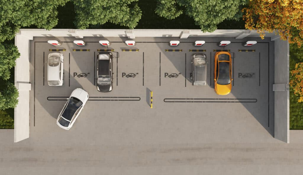 Zu sehen ist ein Ladeparkplatz für Autos aus der sogenannten Vogelperspektive.